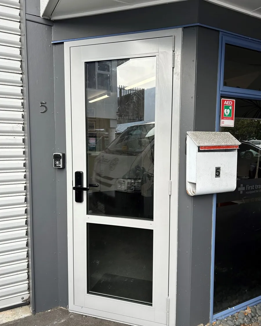 Commercial frontage with smart locks fitted to the glazed entry doors